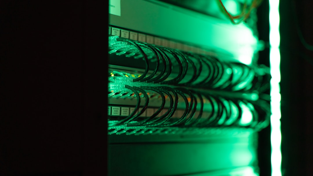 Close-up of a server in a rack, cabling visible